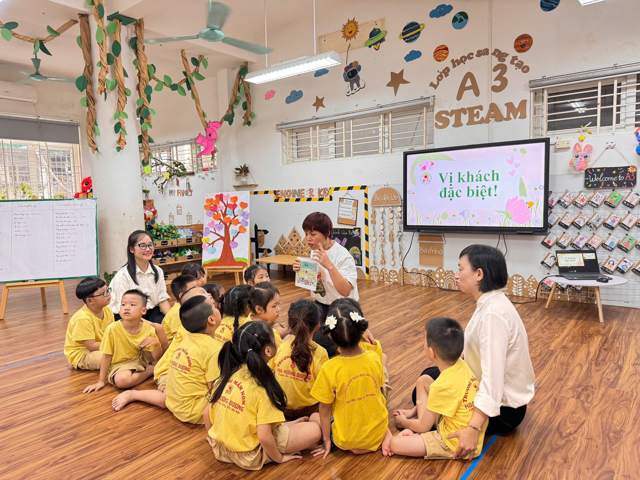 A group of children sitting on the floor in a classroom
AI-generated content may be incorrect.