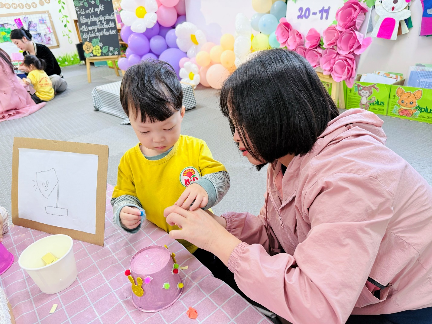 A person and a child at a table

AI-generated content may be incorrect.