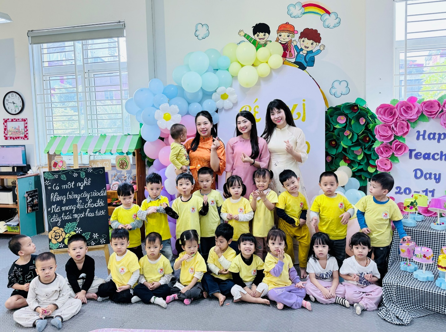 A group of children and adults posing for a photo

AI-generated content may be incorrect.